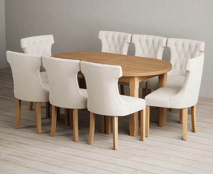 Extending Caversham Oak Oval Dining Table with 8 Natural Clara Chairs